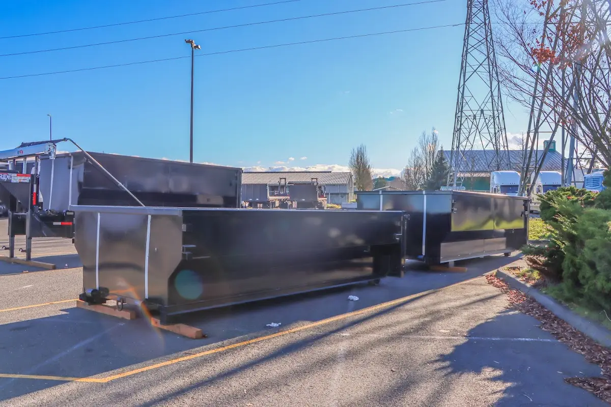 Roll-off dumpster ready for waste disposal at job site for Construction Dumpster Rental in Brighton
